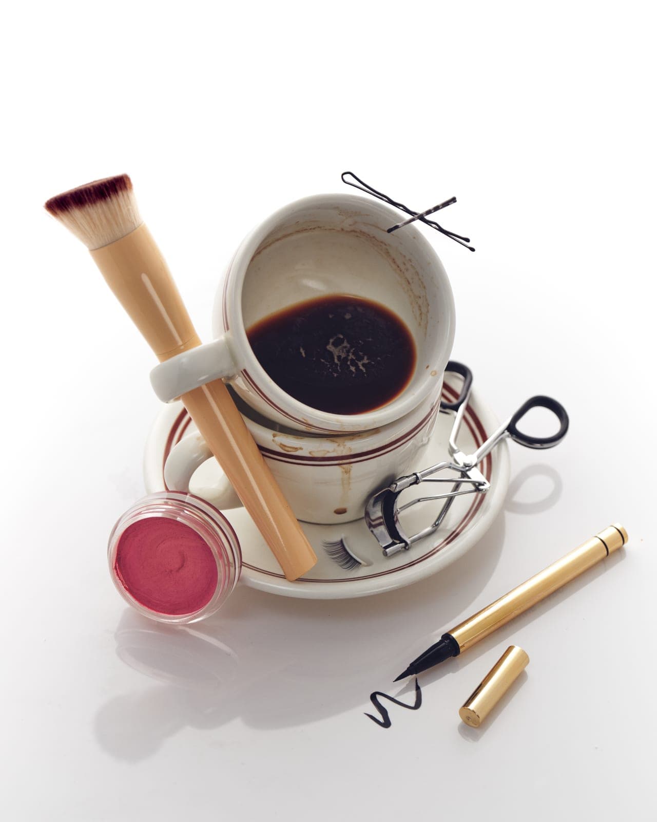 The morning table: coffee and the tools of a shoot.